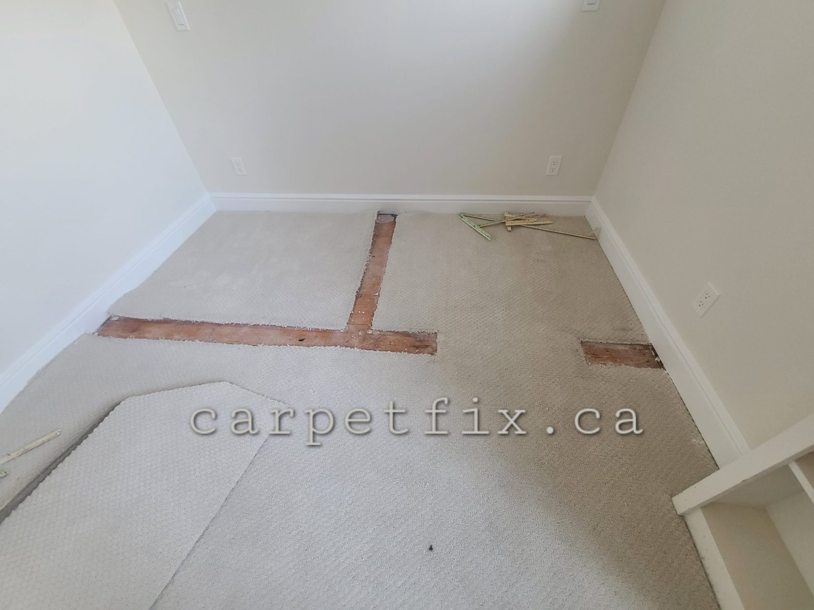 carpet repair before picture after a renovation which removed some walls